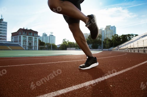 Preview: Cropped image of sportsman's legs running