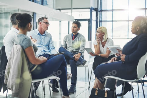 Corporate Team Meeting in Bright Modern Office