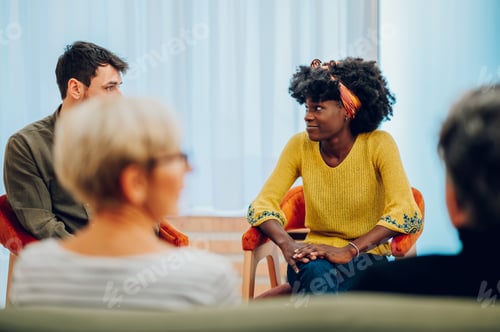 Preview: African american woman talking about her mental health on a group therapy session