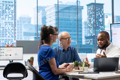 Preview: Elderly people meeting with a financial planner to develop a retirement strategy