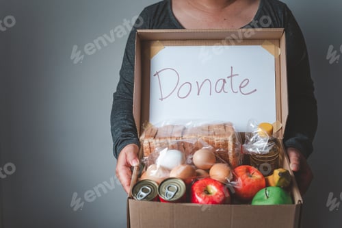 Preview: Volunteers with donation boxes for the needy and provide essential supplies to help during