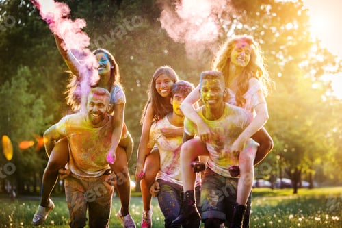 Preview: Friends playing with holi powder