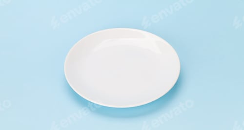 Preview: Empty white plate on blue background