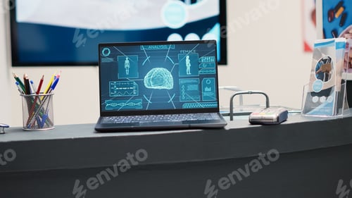 Preview: Laptop with brain x ray scan on counter