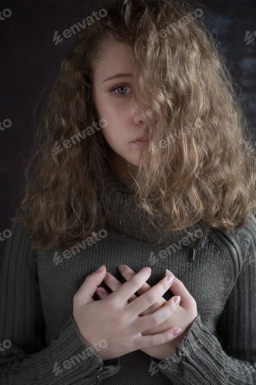 Preview: Portrait of a young sad girl.