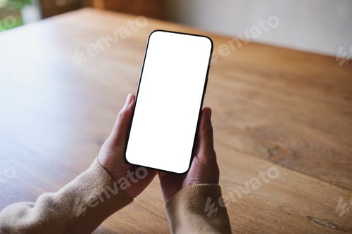 Preview: Mockup image of a woman holding mobile phone with blank desktop screen