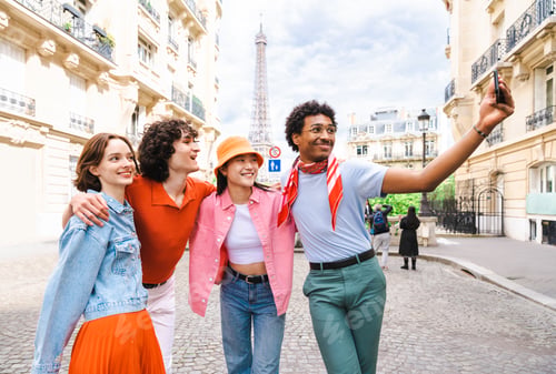 Preview: Group of young happy friends visiting Paris and Eiffel Tower