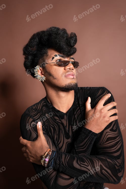 Preview: Young model posing with trendy makeup and accessories