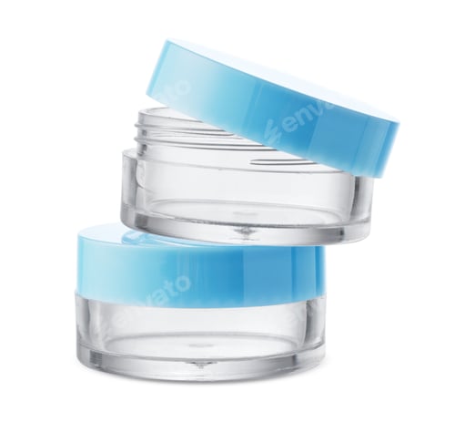 Preview: Clear cosmetic jars stacked with lids on a plain background