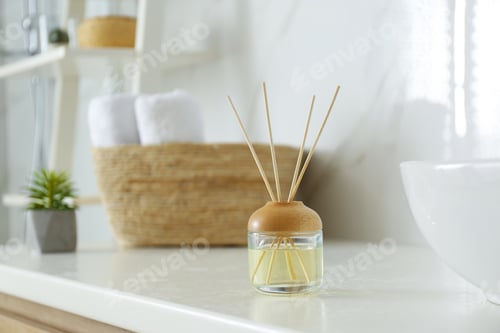 Preview: Reed air freshener on counter in bathroom