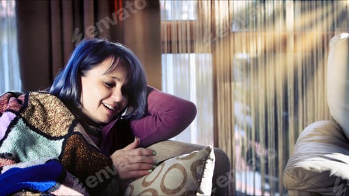 Preview: Young Woman is Looking to Her Cellphone on the Seat