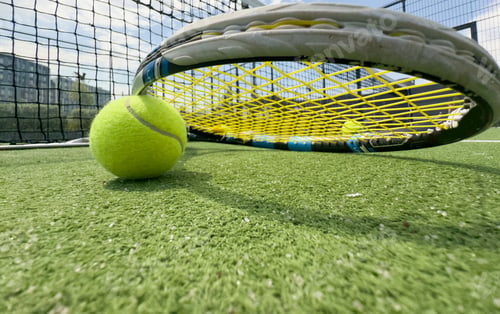 Preview: Close up Tennis racket and ball