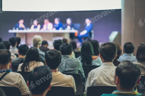 Preview: Rear view of Audience in the conference hall or seminar meeting