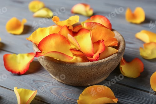 Preview: Bowl with rose petals on wooden background