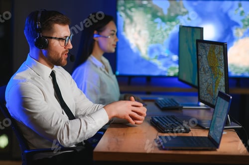 Preview: Male Data Scientist Works on Personal Computer Control and Monitoring Room.