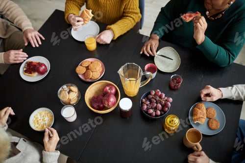 Preview: Senior people enjoying breakfast together in retirement home