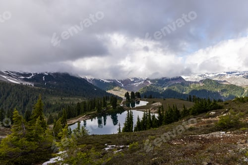 Preview: Scenic View of Elfin Lakes Hike in Squamish Amidst Mountains and Clouds