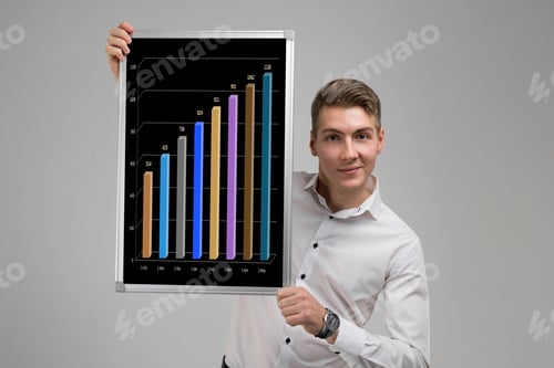 Preview: young man holding a poster with statistics isolated on a light background