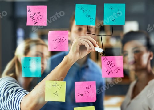 Preview: Shot of a group of colleagues having a brainstorming session in a modern office