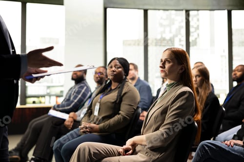 Preview: Business summit in conference hall with professional audience seated on chairs