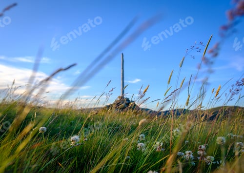 Preview: Scottish Hilltop Cairn With Grasses In Foreground