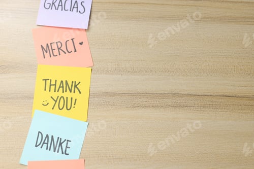 Preview: Thank You In Various Languages Written On Sticky Notes