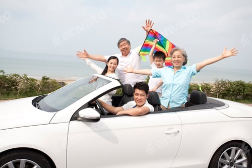 Preview: Happy Family Driving in a Convertible