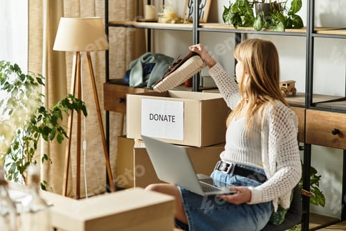 Preview: Young woman embraces sustainable living through clothing donation and recycling efforts