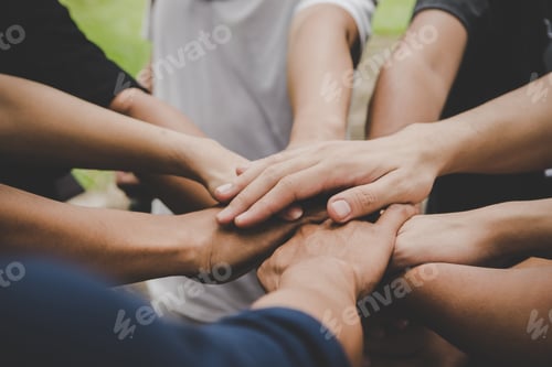 Preview: Business teamwork join hands together. Business teamwork concept