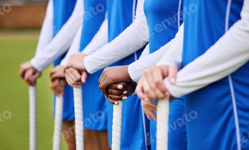Preview: Teamwork, sports and hockey with hands of people on field for workout, challenge and support. Fitne