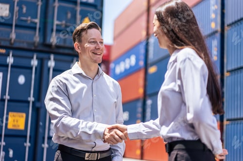 Preview: Caucasian businesswoman and businessman worker wor in container port.