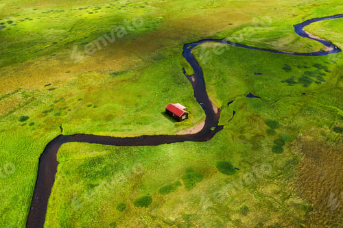 Preview: A river on a field in Iceland. Landscape from the air in summertime in Iceland