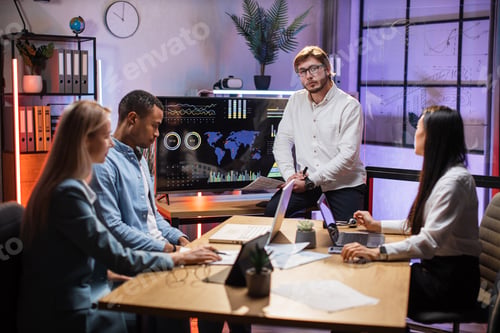 Preview: Multicultural business analytics having meeting at office