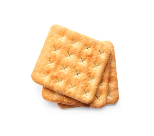 Preview: Delicious crispy crackers isolated on white, top view