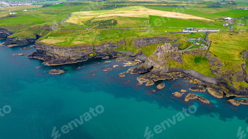 Preview: Aerial view of the historic Dunluce Castle located in the Antrim region of Northern Ireland