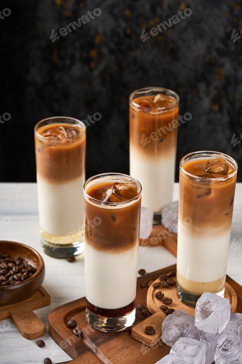 Preview: A group of ice coffee cups on a wooden floor