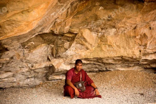 Preview: Buddhist monk visit to the Aurangabad Caves, India.