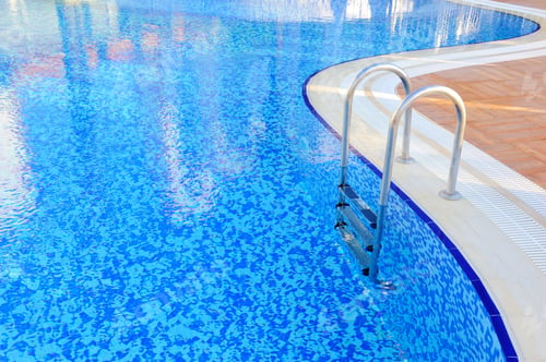 Preview: Swimming pool with stair at hotel close-up