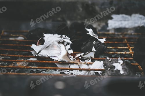 Preview: Dark and organic background of remains of burn paper