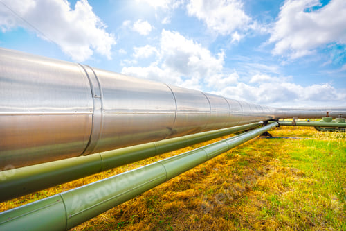 Preview: Geothermal energy. Pipelines of a plant at sunset in Larderello, Tuscany region, Italy