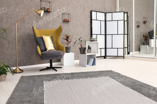 Preview: Room interior with armchair and indoor plants. Trendy home decor