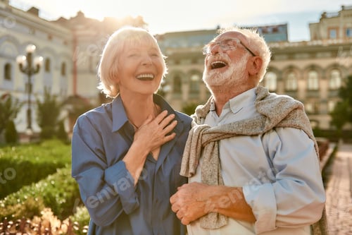 Preview: You Make Me Happy! Portrait of beautiful and stylish senior laughing while standing in the park