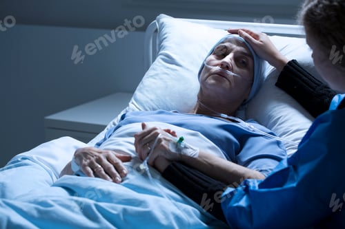 Daughter supporting dying woman