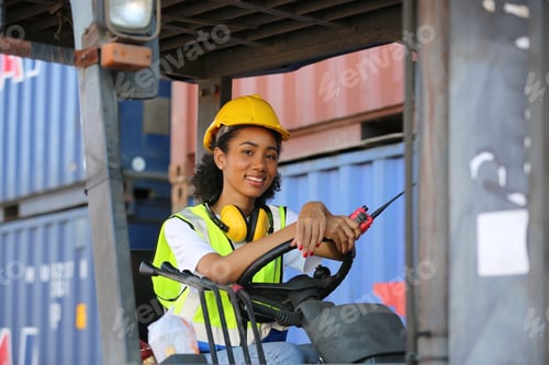 Preview: Foreman control loading Containers box from Cargo freight ship for import export.