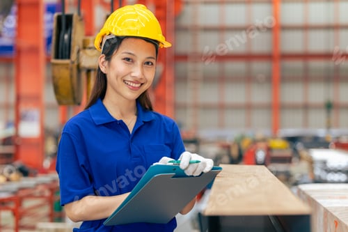 Preview: Young Asian woman engineer worker happy smiling professional working in metal sheet plant factory