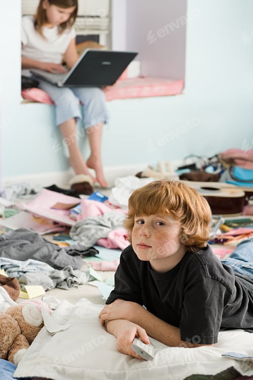 Preview: A boy and girl in a messy bedroom