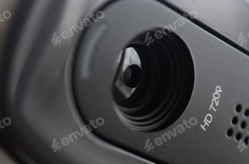 Preview: A modern web camera is installed on the body of a flat screen monitor