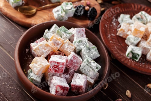 Preview: Turkish delight on a wooden table.