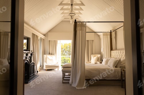 Preview: Elegant bedroom with canopy bed and cozy seating area, inviting relaxation, copy space