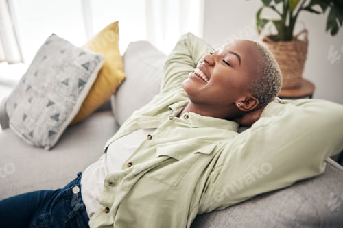 Preview: Tired, happy or black woman on sofa to relax in living room with head on hand for sleeping or nap t
